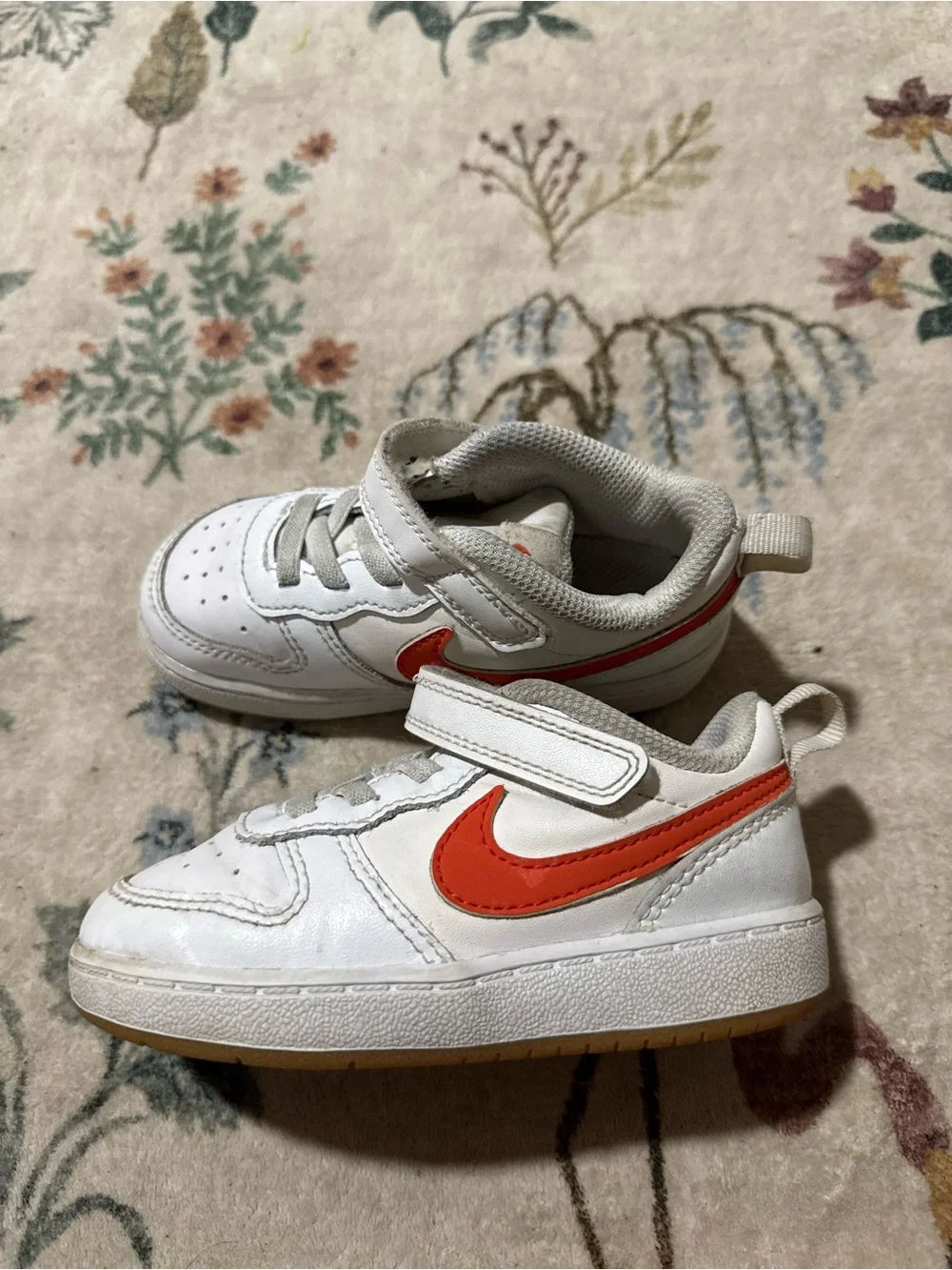 Nike White Kids Sneakers with Orange Swoosh Accent 8C